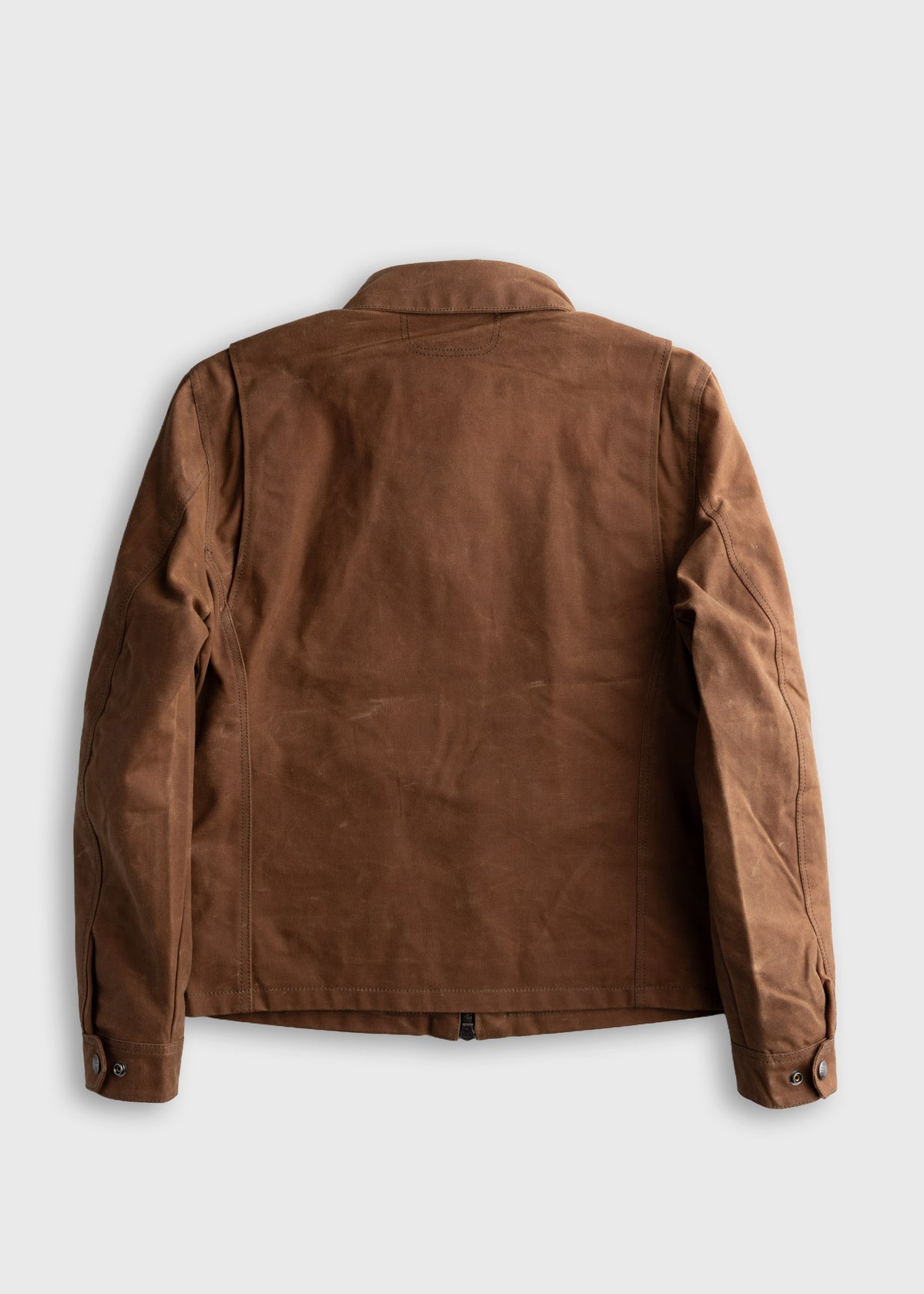 Brown leather jacket displayed from the back, highlighting its smooth texture and classic design against a plain background.