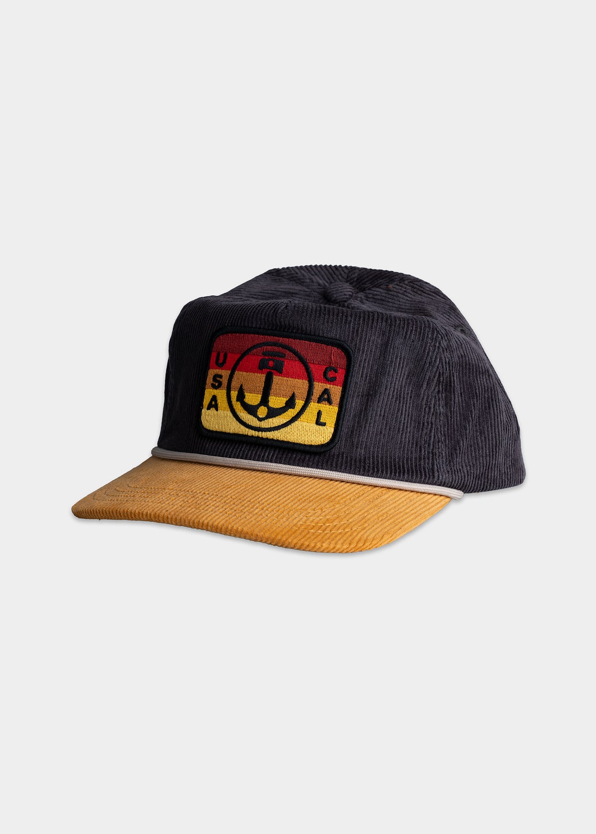 Gray cap with a yellow brim, featuring a colorful patch with an anchor and "USA CAL" text on the front.