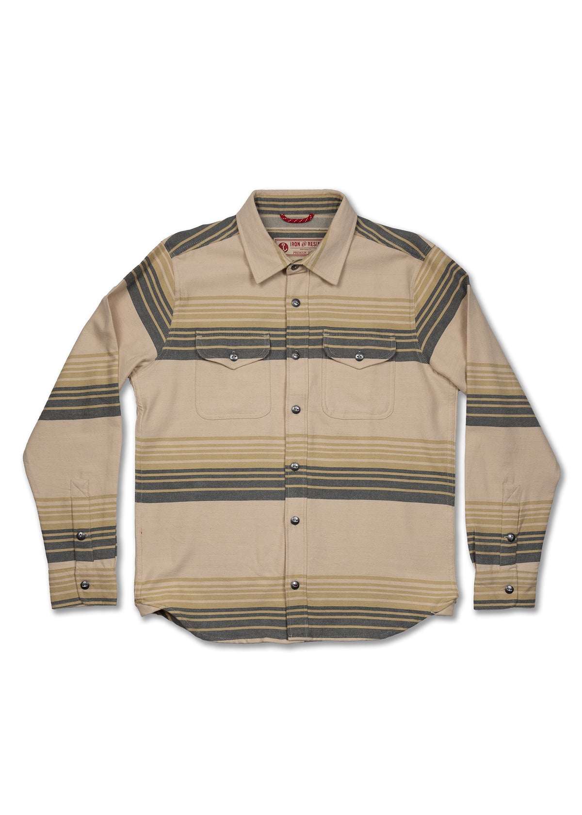 Tan and gray striped button-up shirt with two chest pockets, laid flat. Features long sleeves and a classic collar.
