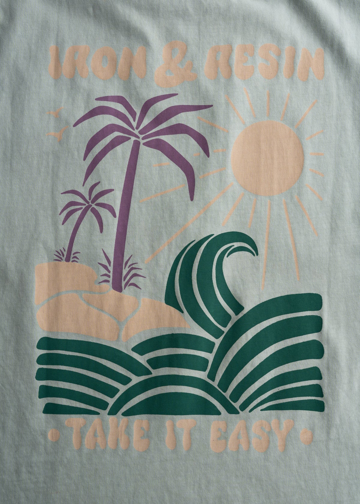 Close up of custom graphic print on cotton t-shirt, highlighting print detail and finish