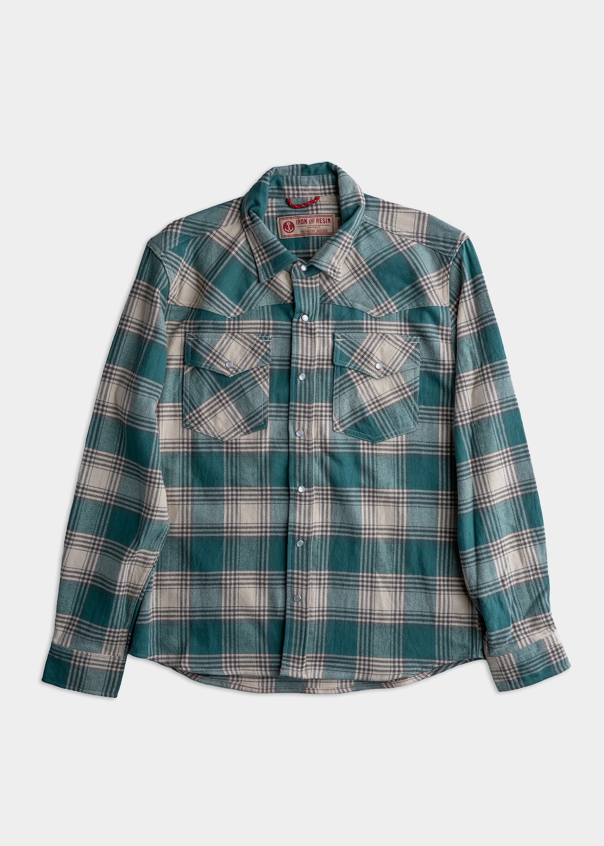 Green and beige plaid flannel shirt with buttoned front and two chest pockets, displayed on a plain white background.