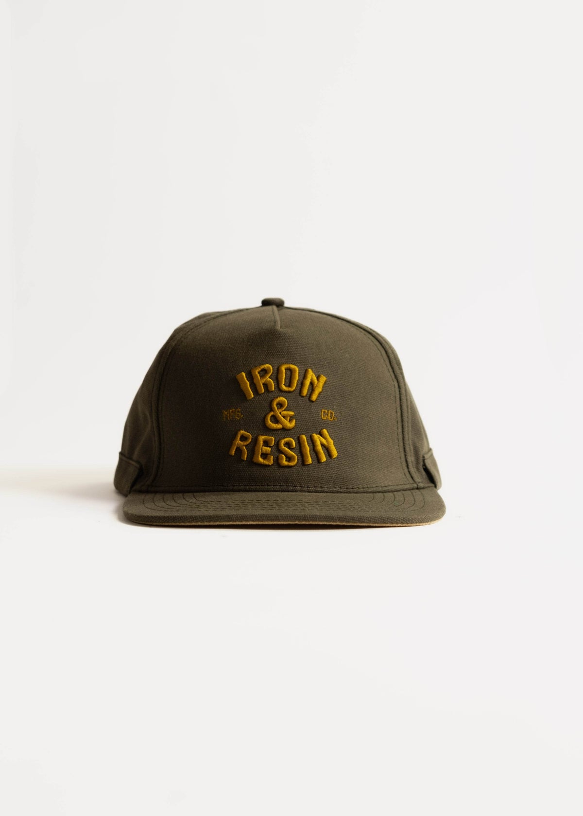 Green cap with yellow "Iron & Resin" embroidery on front, displayed against a white background.