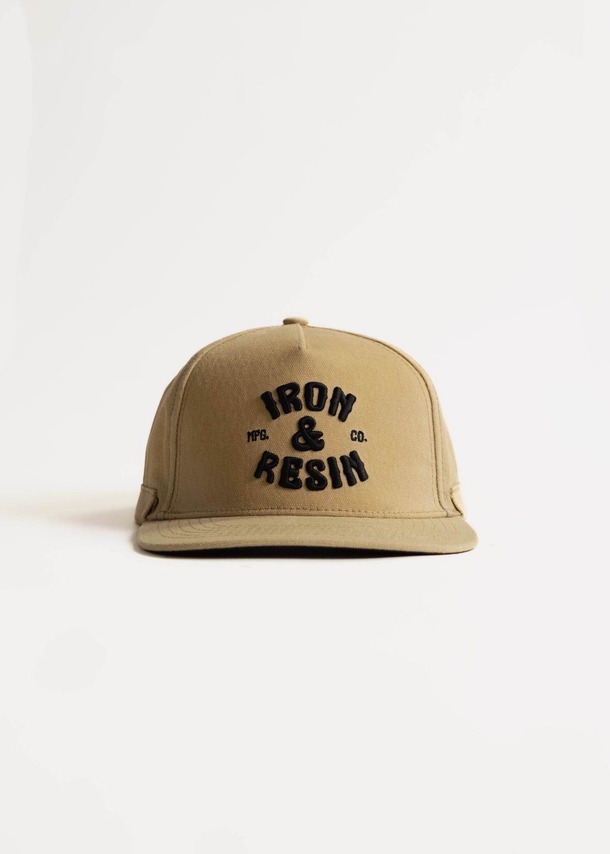 Tan cap with "Iron & Resin" logo in black on front, set against a plain white background, showcasing its simple design.
