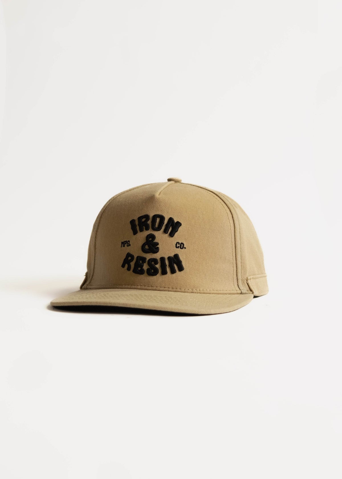 Tan cap with "Iron & Resin" logo in black text, displayed against a white background, showcasing casual style and branding.
