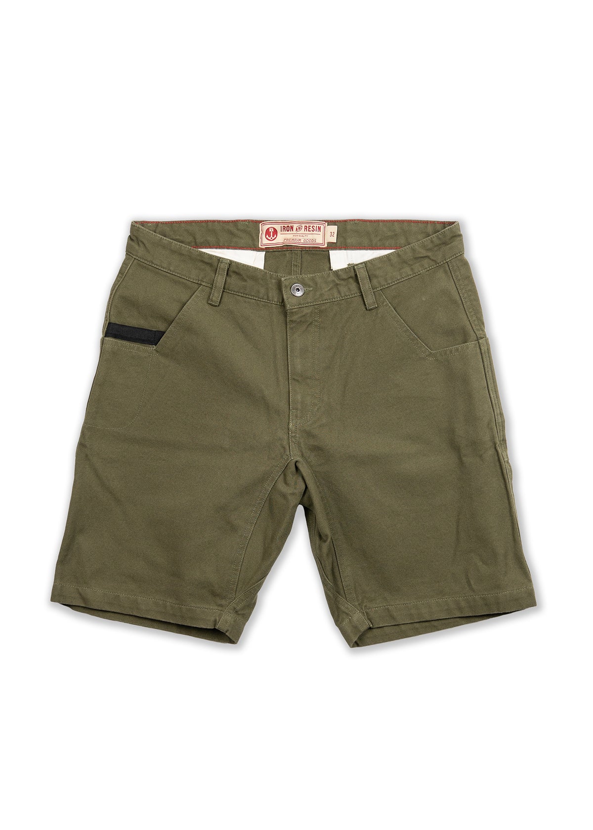 Green Iron & Resin shorts with front pockets and a black accent on the left. Button closure and belt loops are visible.