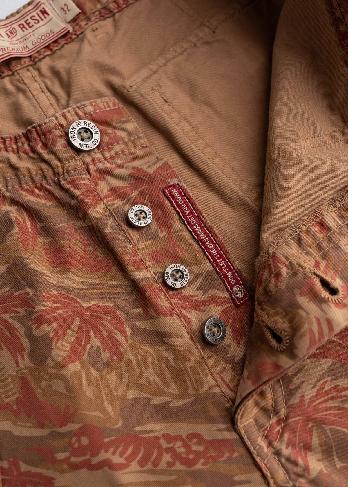 Close up of Prescott twill fabric showing custom button fly closer, durable cotton weave and workwear texture