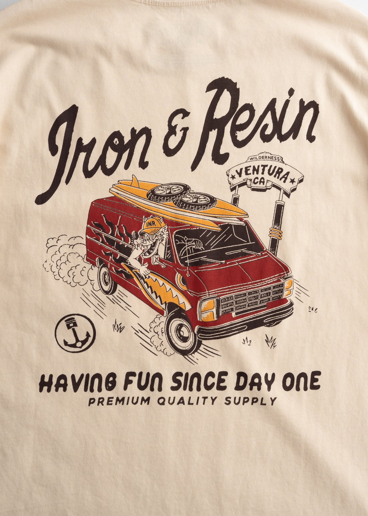 Illustration of a red van with surfboards, "Iron & Resin" text, and "Having Fun Since Day One" slogan on a beige background.