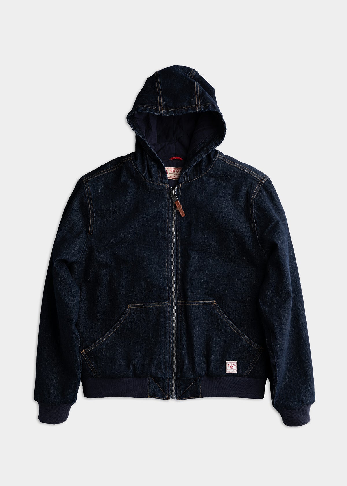 Dark denim hooded jacket with front zipper and pockets, displayed on a white background. Casual, stylish outerwear.
