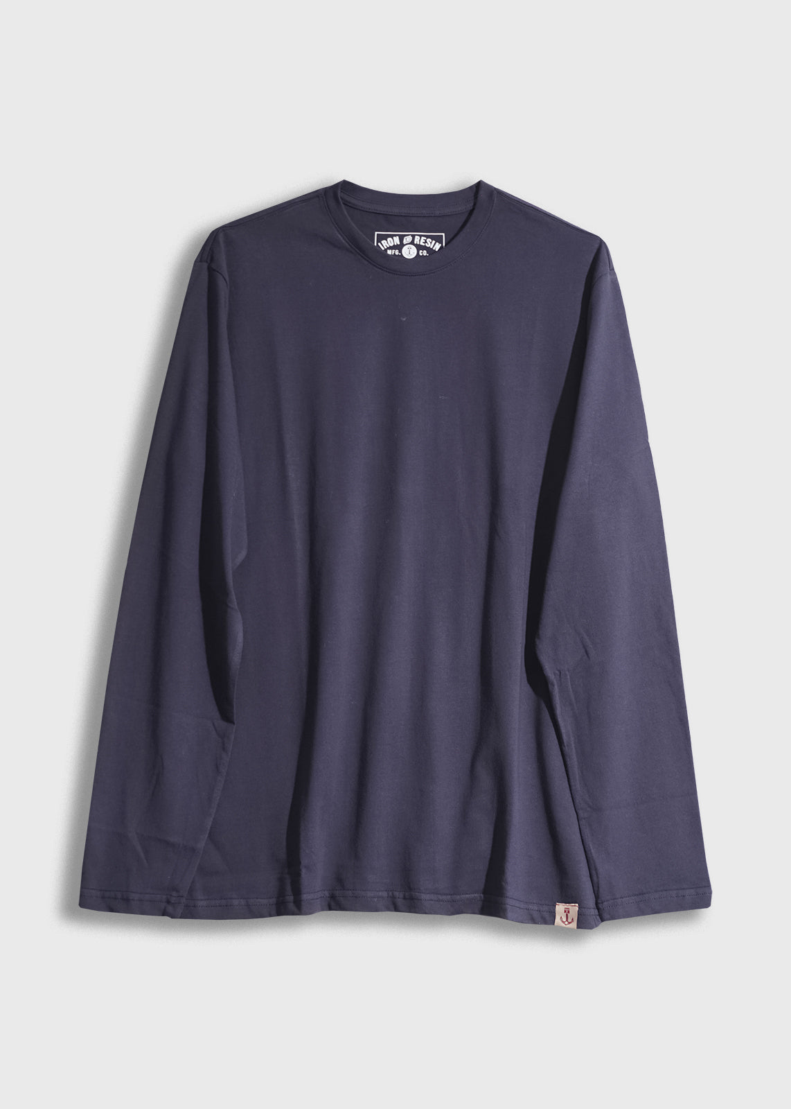 Navy blue long-sleeve shirt with a crew neck, displayed on a white background. Simple design, casual style.