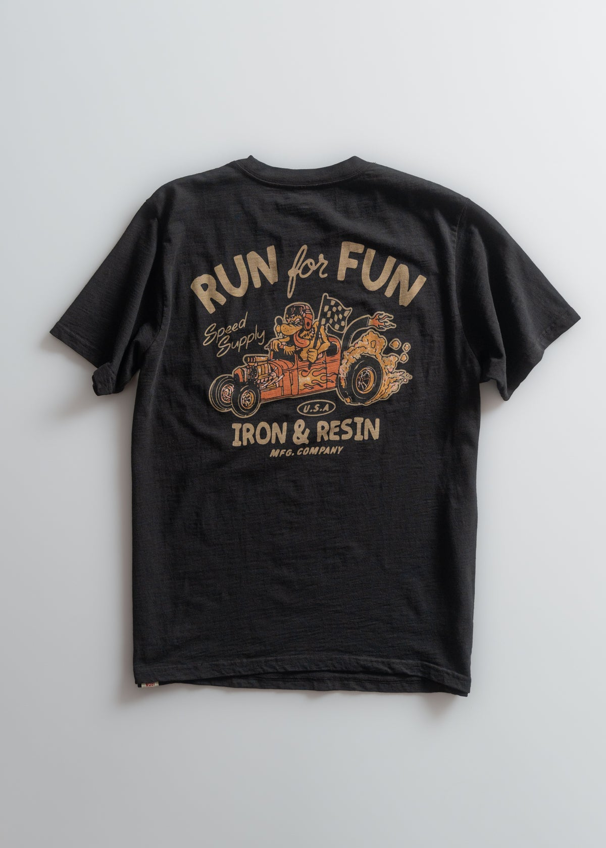 Black T-shirt with "Run for Fun" and "Iron & Resin" text, featuring a cartoon dog driving a hot rod. Retro design.