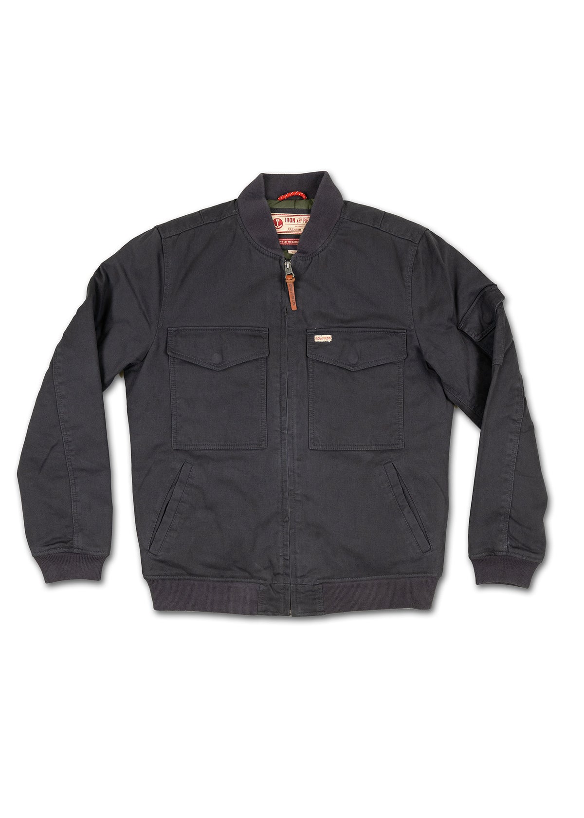 Dark bomber jacket with front zipper, two chest pockets, and ribbed cuffs, displayed on a white background.