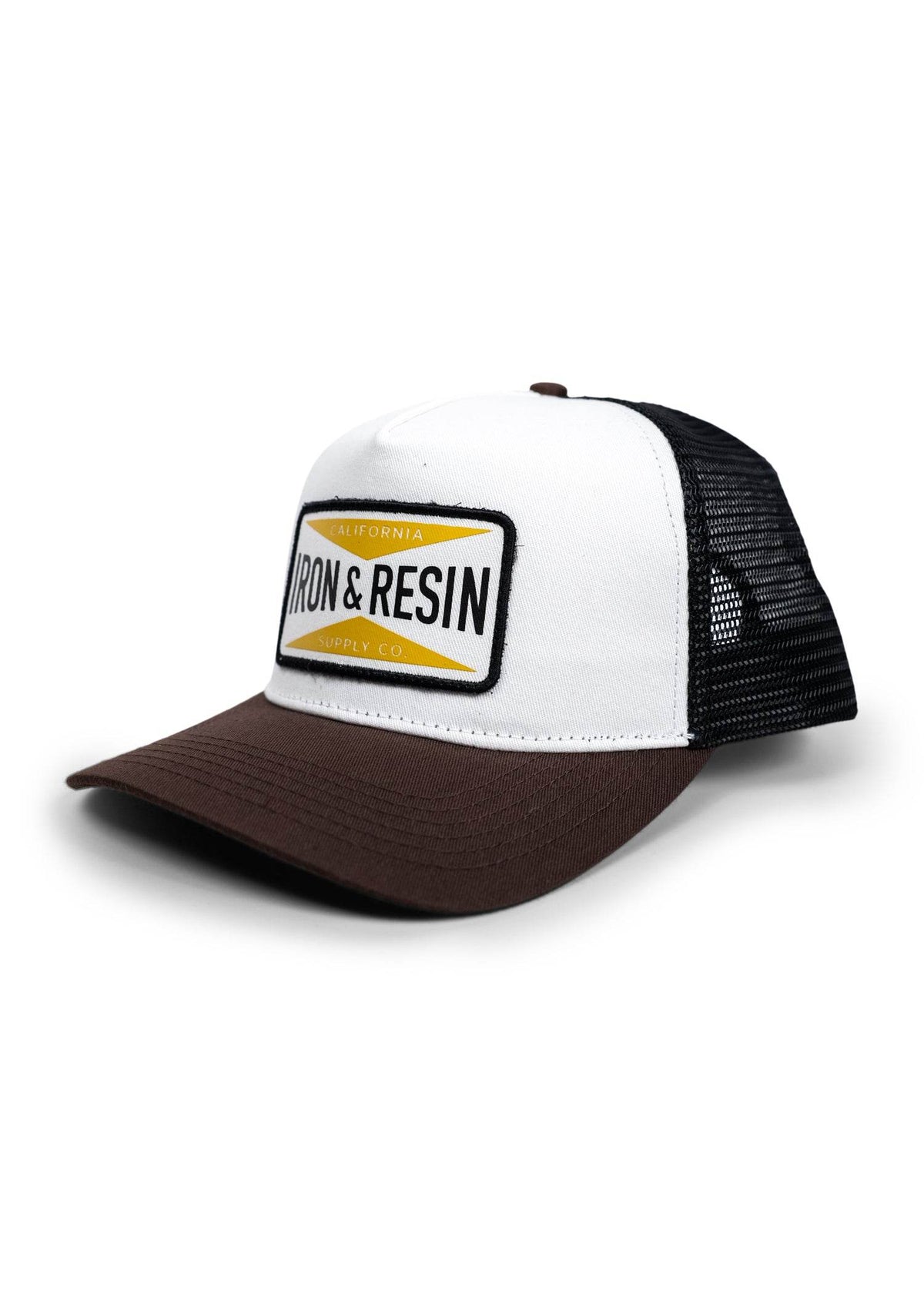 White and brown trucker hat with "Iron & Resin" logo on front. Black mesh back and curved brim. California style cap.