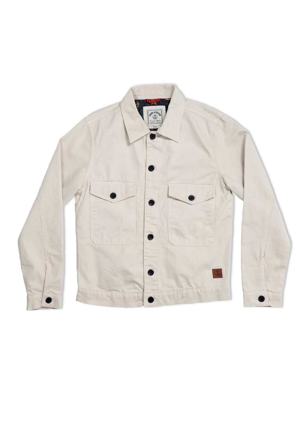 Cream jacket with black buttons, two chest pockets, and a visible inner label. Simple, stylish design on a white background.
